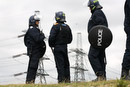 Police protect Kingsnorth Power Station as protester have a day of action. Climate Camp calls for the government to take action on climate change and stop the bulding of Kingsnorth coal fired electricity station. Rochester, Kent.
© Jess Hurd/reportdigital.co.uk
Tel: 01789-262151/07831-121483  
info@reportdigital.co.uk  
NUJ recommended terms & conditions apply. Moral rights asserted under Copyright Designs & Patents Act 1988. Credit is required. No part of this photo to be stored, reproduced, manipulated or transmitted by any means without permission.