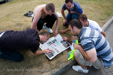 Vestas workers look at the coverage of their dispute in the Guardian newspaper. Occupation at the Vesta wind turbine plant, Isle of Wight.
© Jess Hurd/reportdigital.co.uk
Tel: 01789-262151/07831-121483  
info@reportdigital.co.uk  
NUJ recommended terms & conditions apply. Moral rights asserted under Copyright Designs & Patents Act 1988. Credit is required. No part of this photo to be stored, reproduced, manipulated or transmitted by any means without permission.