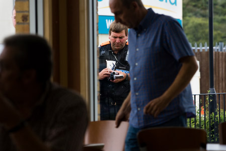 Press photographers and video journalists are covertly fimed by the police Forward Intelligence Team through the window of a McDonald's restaurant where they were sending images several miles from Climate Camp. The camp calls for the government to take action on climate change and stop the bulding of Kingsnorth coal fired electricity station. Rochester, Kent.
© Jess Hurd/reportdigital.co.uk
Tel: 01789-262151/07831-121483  
info@reportdigital.co.uk  
NUJ recommended terms & conditions apply. Moral rights asserted under Copyright Designs & Patents Act 1988. Credit is required. No part of this photo to be stored, reproduced, manipulated or transmitted by any means without permission.