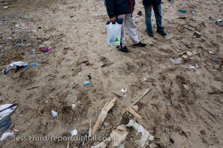 Homeless refugees in Calais cross the area where they lived in the woods before the Jungle was cleared. France.
© Jess Hurd/reportdigital.co.uk
Tel: 01789-262151/07831-121483  
info@reportdigital.co.uk  
NUJ recommended terms & conditions apply. Moral rights asserted under Copyright Designs & Patents Act 1988. Credit is required. No part of this photo to be stored, reproduced, manipulated or transmitted by any means without permission.