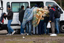 Refugees in Calais made homeless after the clearing of the Jungle queue for rain coats from the Salam charity. France.
© Jess Hurd/reportdigital.co.uk
Tel: 01789-262151/07831-121483  
info@reportdigital.co.uk  
NUJ recommended terms & conditions apply. Moral rights asserted under Copyright Designs & Patents Act 1988. Credit is required. No part of this photo to be stored, reproduced, manipulated or transmitted by any means without permission.