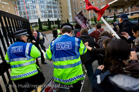 Unite Against Fascism protestors break through the gate into BBC Television Centre. Demonstration opposing the invitation of BNP leader Nick Griffin on Question Time. White City.
© Jess Hurd/reportdigital.co.uk
Tel: 01789-262151/07831-121483  
info@reportdigital.co.uk  
NUJ recommended terms & conditions apply. Moral rights asserted under Copyright Designs & Patents Act 1988. Credit is required. No part of this photo to be stored, reproduced, manipulated or transmitted by any means without permission.
