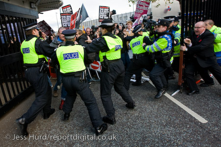 Unite Against Fascism protestors break through the gate into BBC Television Centre. Demonstration opposing the invitation of BNP leader Nick Griffin on Question Time. White City.
© Jess Hurd/reportdigital.co.uk
Tel: 01789-262151/07831-121483  
info@reportdigital.co.uk  
NUJ recommended terms & conditions apply. Moral rights asserted under Copyright Designs & Patents Act 1988. Credit is required. No part of this photo to be stored, reproduced, manipulated or transmitted by any means without permission.