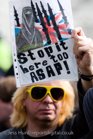 Anti mosque poster. English Defence League march in support of the Dutch Islamophobic politician Geert Wilders who was a guest of UKIP at the Houses of Parliament. London.

© Jess Hurd/reportdigital.co.uk
Tel: 01789-262151/07831-121483  
info@reportdigital.co.uk  
NUJ recommended terms & conditions apply. Moral rights asserted under Copyright Designs & Patents Act 1988. Credit is required. No part of this photo to be stored, reproduced, manipulated or transmitted by any means without permission.