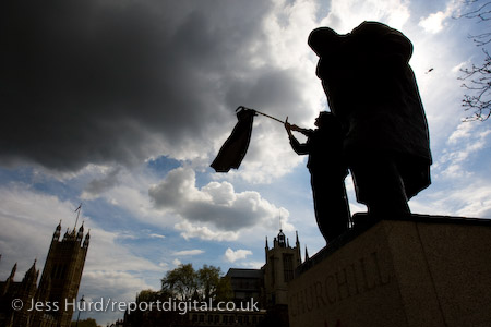 Protester stnding on the Winston Churchill statue gives Parliament the finger. Mayday, London.

© Jess Hurd/reportdigital.co.uk
Tel: 01789-262151/07831-121483  
info@reportdigital.co.uk  
NUJ recommended terms & conditions apply. Moral rights asserted under Copyright Designs & Patents Act 1988. Credit is required. No part of this photo to be stored, reproduced, manipulated or transmitted by any means without permission.