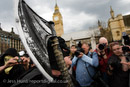 The executioner arrives as effigie of politicians are hung in Parliament Square during a May Day demonstration. Central London. 

© Jess Hurd/reportdigital.co.uk
Tel: 01789-262151/07831-121483  
info@reportdigital.co.uk  
NUJ recommended terms & conditions apply. Moral rights asserted under Copyright Designs & Patents Act 1988. Credit is required. No part of this photo to be stored, reproduced, manipulated or transmitted by any means without permission.